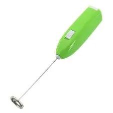 A green electric whisk is sitting on the floor.