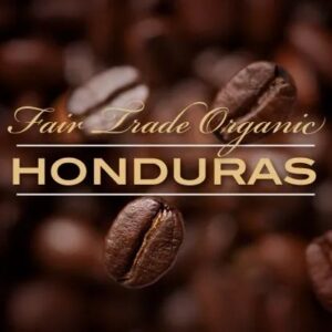A close up of coffee beans with the words fair trade organic honduras in front.