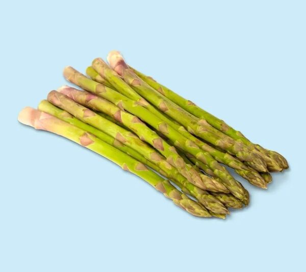 A bunch of asparagus is sitting on the table