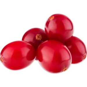 A pile of red cherries on top of each other.
