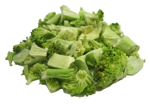 A pile of broccoli sitting on top of a table.