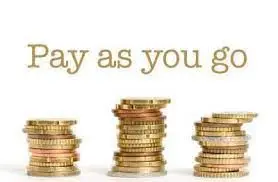 A row of stacks of coins with the words " pay as you go ".